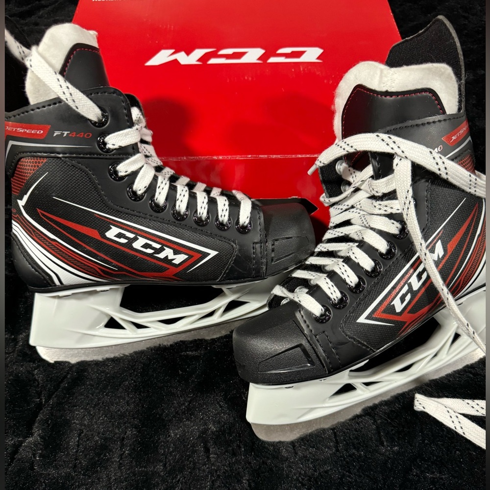 CCM Black and Red Youth Ice Hockey Skates
